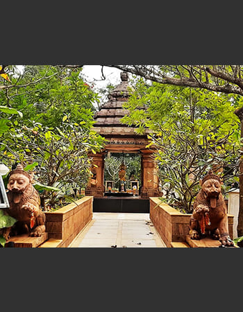Corporate lobby stone carving featuring intricate architectural details and cultural motifs