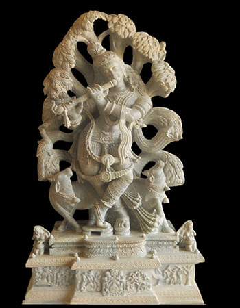 Beautiful green stone sculpture showcasing traditional Odisha temple art with detailed ornamentation