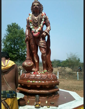 Divine Hanuman idol in handcrafted sandstone with spiritual symbolism, embodying power and protection for sacred spaces