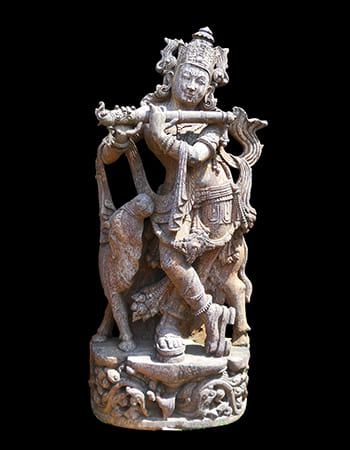 Majestic Hanuman sculpture with blessing gesture in natural sandstone, embodying divine protection and spiritual energy