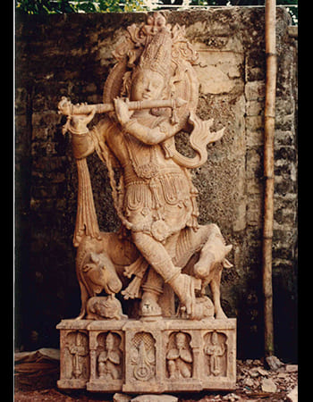 Traditional Lord Hanuman statue in sandstone with detailed carving, representing fearless devotion and sacred strength