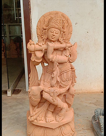 Divine Hanuman idol in handcrafted sandstone with spiritual symbolism, embodying power and protection for sacred spaces