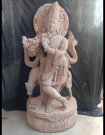 Divine Hanuman idol in handcrafted sandstone with spiritual symbolism, embodying power and protection for sacred spaces