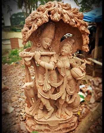 Divine Hanuman idol in handcrafted sandstone with spiritual symbolism, embodying power and protection for sacred spaces