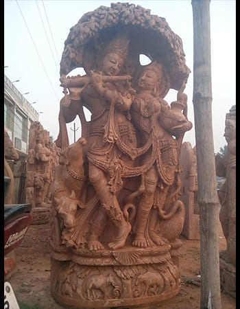 Divine Hanuman idol in handcrafted sandstone with spiritual symbolism, embodying power and protection for sacred spaces