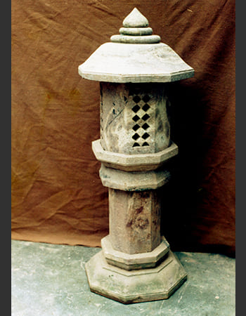 Handcrafted outdoor light fixture with lotus motif base and classical sandstone carving perfect for pathway illumination