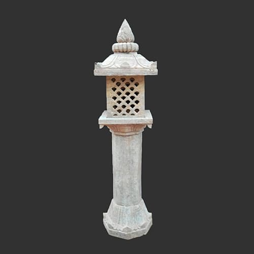 Elegant handcrafted sandstone light lamp stand showcasing traditional artistry with intricate carved details for garden and temple illumination