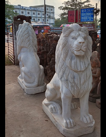 Serene white marble Shiva sculpture in meditation pose with traditional third eye and serpent details