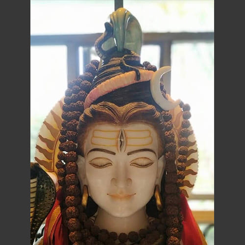 Exquisite white marble sculpture showcasing traditional Odisha craftsmanship with intricate carved details