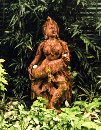 Classical dancing lady statue with graceful posture and detailed traditional Indian attire