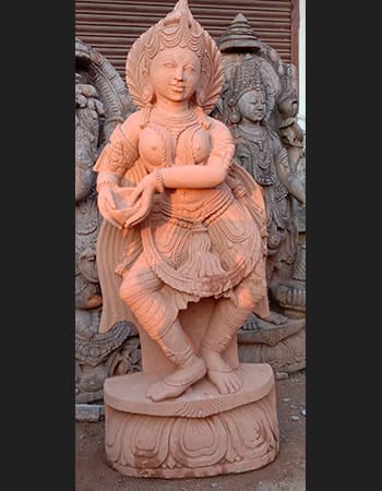 Elegant Devadasi sculpture depicting classical Indian dance mudra with detailed facial expressions