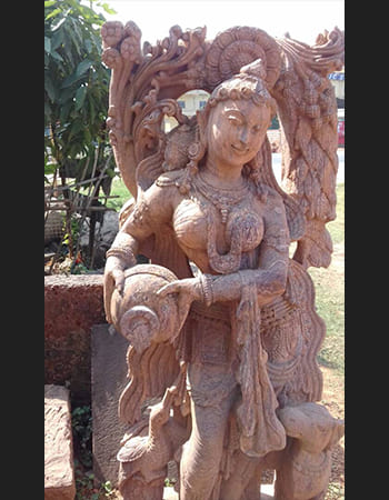 Classical dancing lady sculpture with flowing dupatta and expressive hand gestures