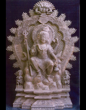 Shiva with Nandi bull in devotional pose, traditional sandstone sculpture depicting divine devotion and loyalty